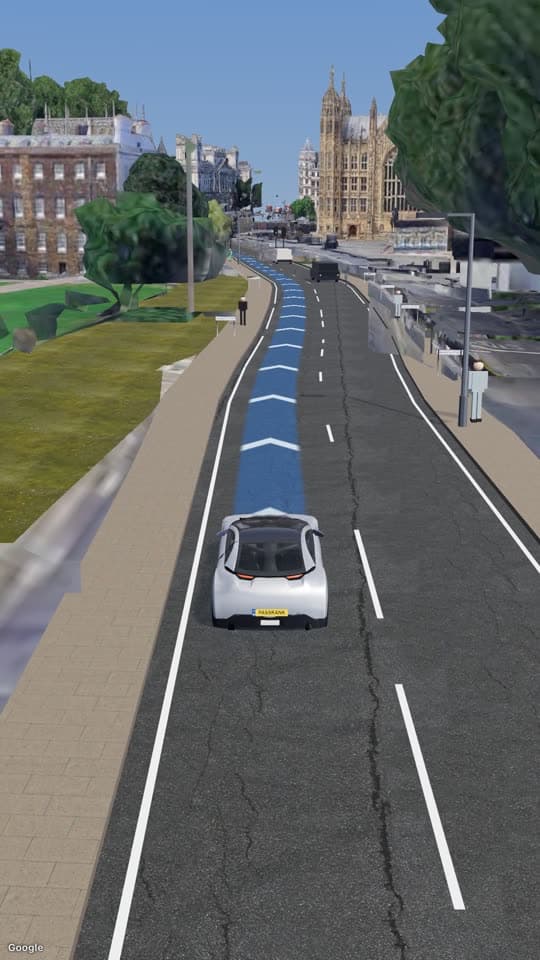 The PassRank simulator in real-town 3D: a learner car on a Westminster road, the blue route line ahead and the Houses of Parliament behind.