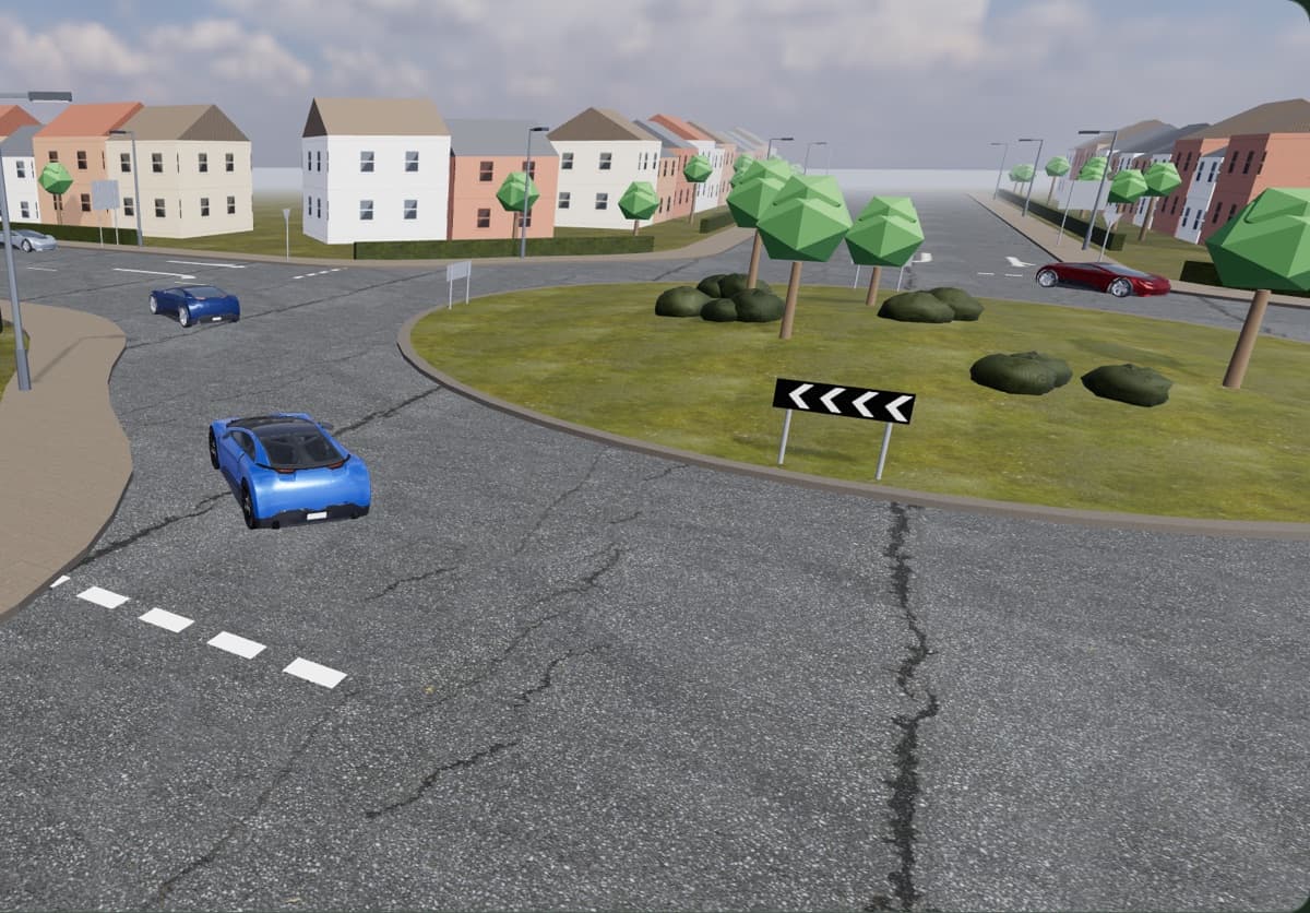 Approaching a two-lane roundabout between houses in the 3D simulator